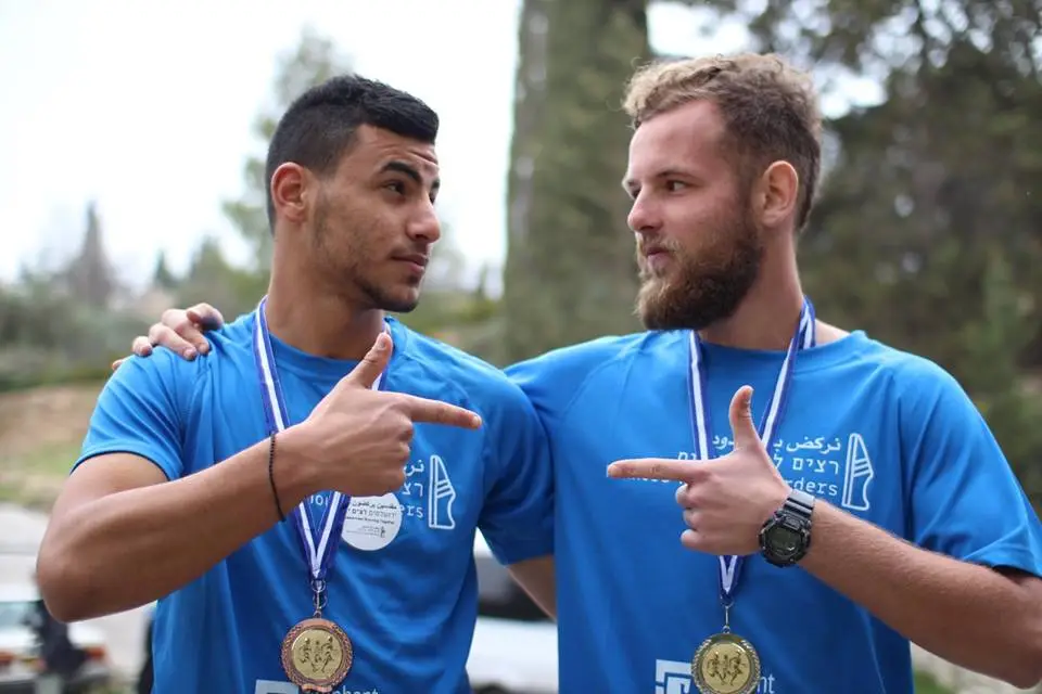 Runners Without Borders running club in Jewish and Arab joint training groups across east and west Jerusalem, Israel